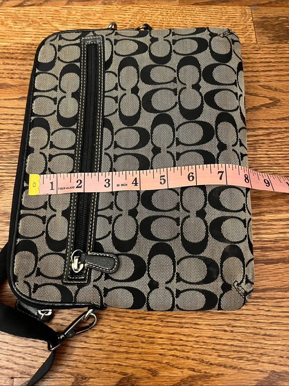 Coach signature monogram padded tablet case with a black stripe
